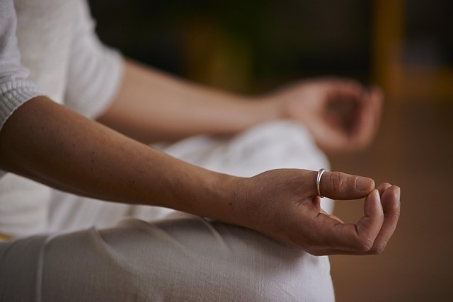 mindfulness meditation class with participants sitting in calm learning environment